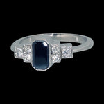 Fehérarany gyűrű fekete gyémánttal, fehér brillekkel